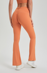 Mona Sharp | Flare legging met gekruiste buikcontrole